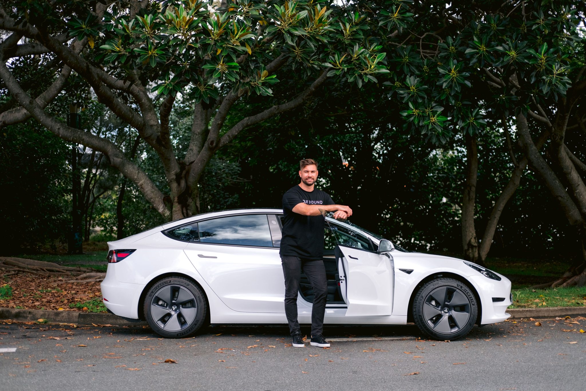 Residents Of This Luxe North Sydney High-Rise Get Free Teslas